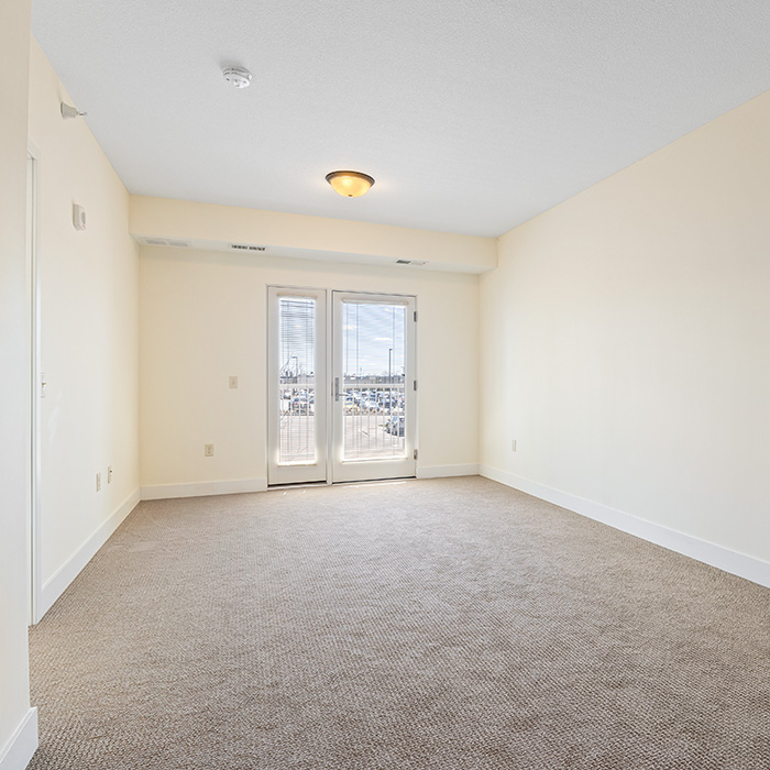 Living room with a balcony.