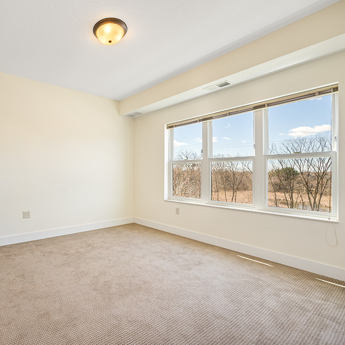 Bedroom in one-bedroom senior apartment.